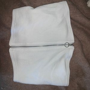 small white crop top with a front zipper